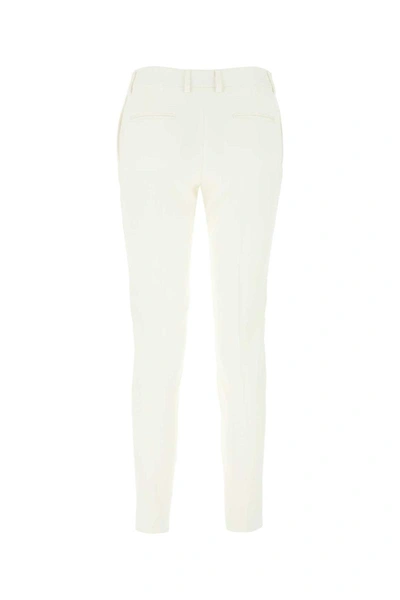 Shop Saint Laurent Pants In White