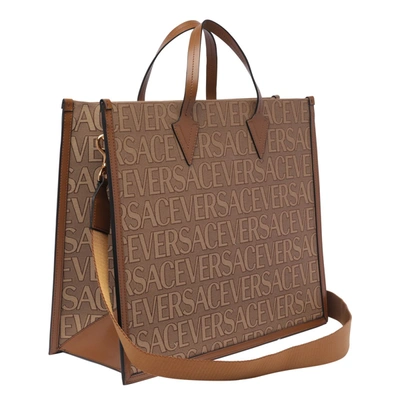 Shop Versace Brown Canvas And Leather Allover Tote Bag