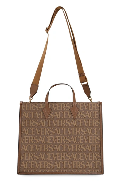 Shop Versace Brown Canvas And Leather Allover Tote Bag