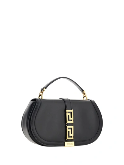 Shop Versace Top Handle Bags In Black