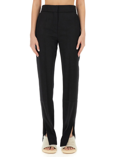 Shop Jacquemus Pants "tibau" In Black