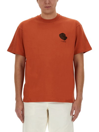 Shop Carhartt T-shirt "diagram" In Orange