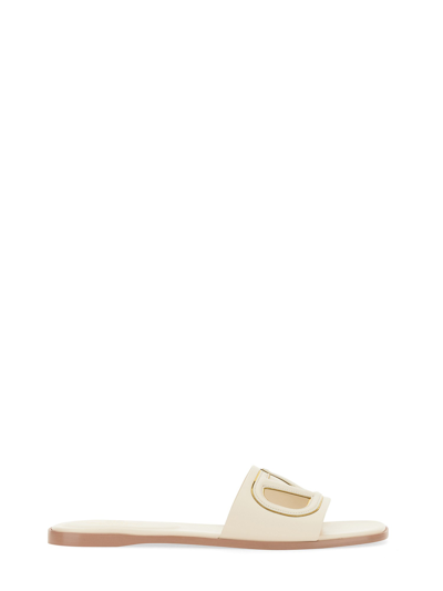 Shop Valentino Sandal Slide Vlogo Cut-out In Ivory