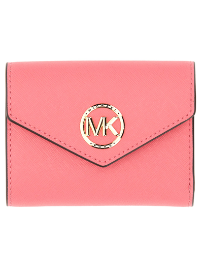 Shop Michael Michael Kors Greenwich Trifold Wallet In Pink