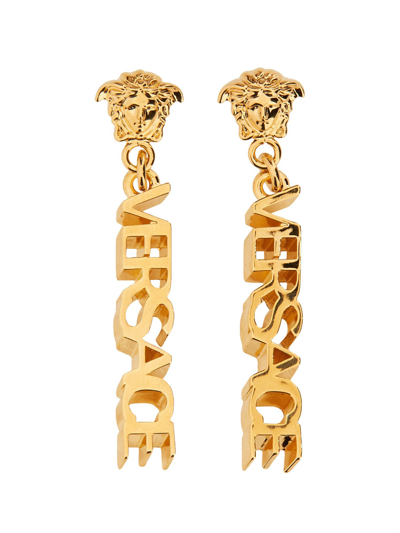 Shop Versace Logoed Drop Earrings In Gold