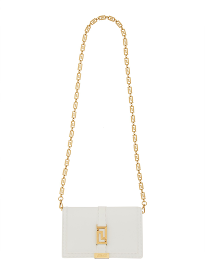 Shop Versace Mini "greca Goddess" Bag In White