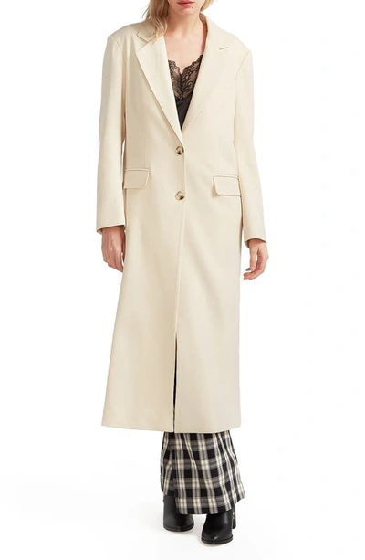 Belle & Bloom Transcendent Asymmetric Split Hem Coat In French Vanilla
