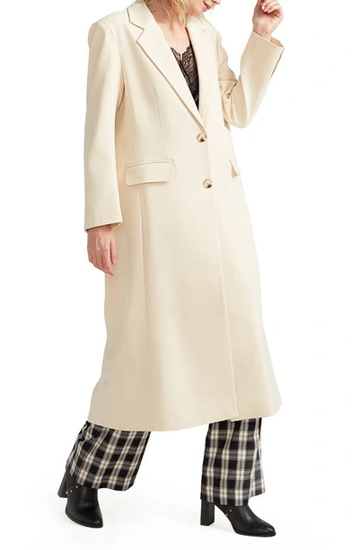Belle & Bloom Transcendent Asymmetric Split Hem Coat In French Vanilla
