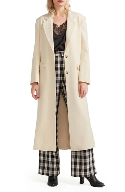 Belle & Bloom Transcendent Asymmetric Split Hem Coat In French Vanilla