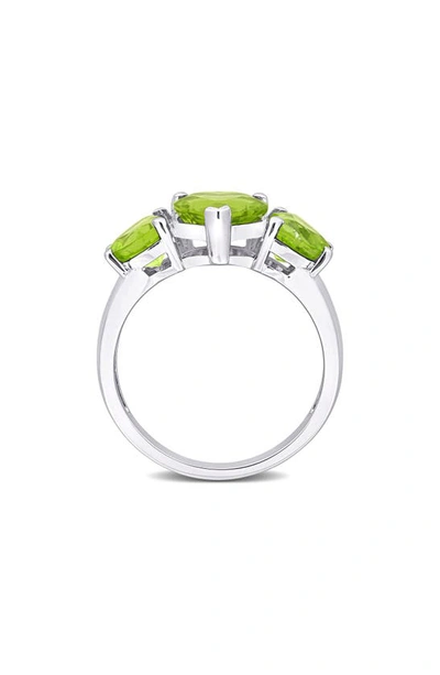 Shop Delmar Sterling Silver Heart Cut Trio Peridot Ring In Green