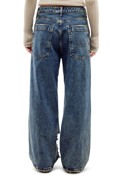 Shop Bdg Urban Outfitters Extreme Ripped Wide Leg Jeans In Mid Vintage