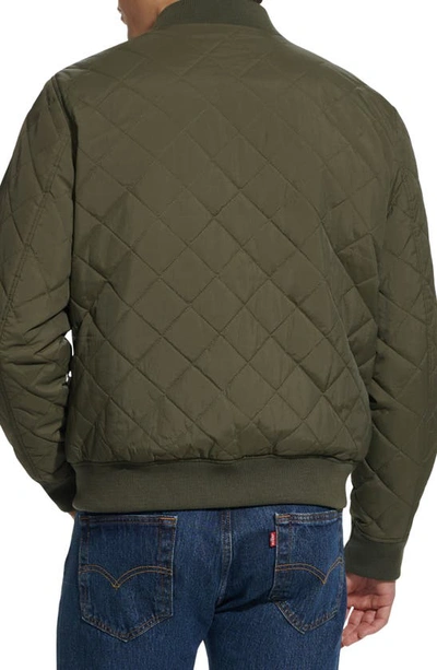 Shop Levi's Quilted Nylon Bomber Jacket In Olive