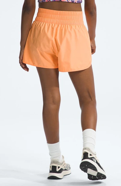 Shop The North Face Kids' Never Stop Woven Shorts In Bright Cantaloupe