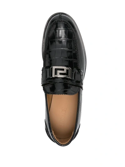 Shop Versace Flat Shoes In Black/ruthenium