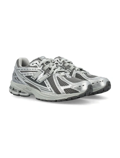 Shop New Balance 1906 Low Top Sneakers In Silver Silver