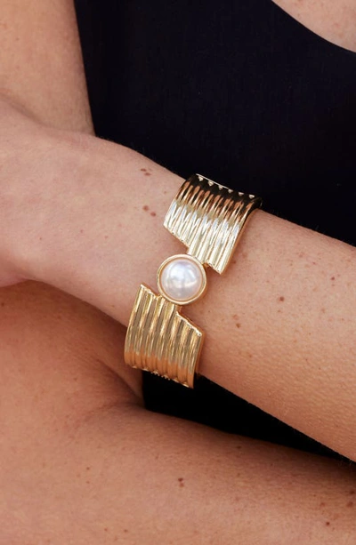 Shop Savvy Cie Jewels Imitation Pearl Hinged Bangle Bracelet In Yellow