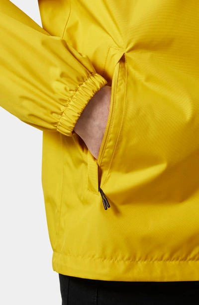 Shop Helly Hansen Vancouver Hooded Rain Jacket In Gold Rush