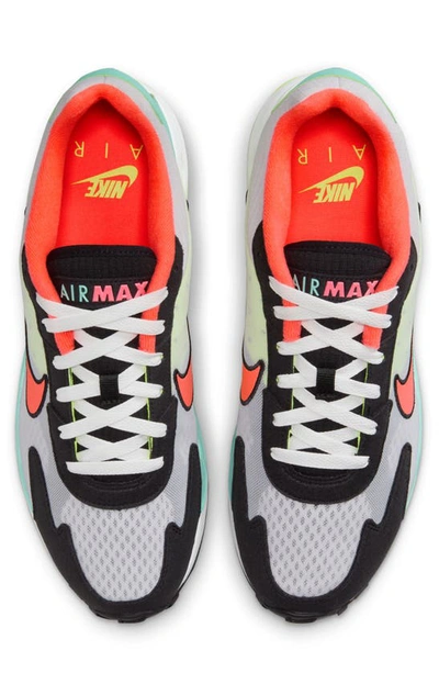 Shop Nike Air Max Solo Sneaker In Vast Grey/ Hot Punch/ Volt