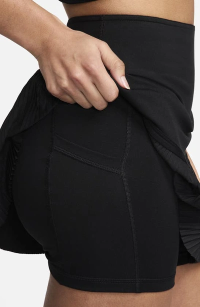Shop Nike Dri-fit Pleated Miniskirt In Black/ Black/ White