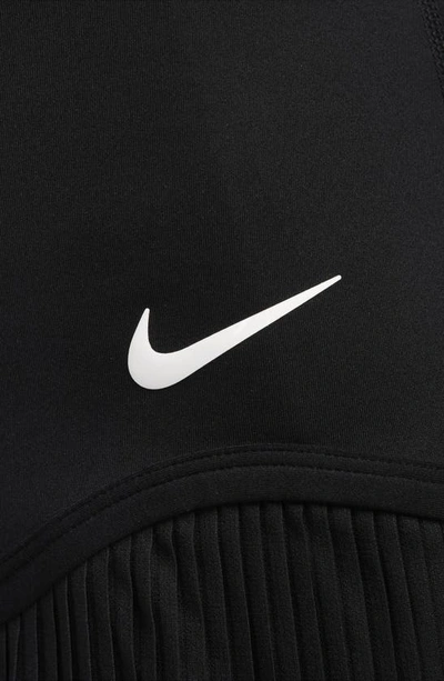 Shop Nike Dri-fit Pleated Miniskirt In Black/ Black/ White