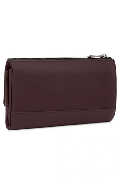 Shop Tumi Leather Travel Wallet In Deep Plum