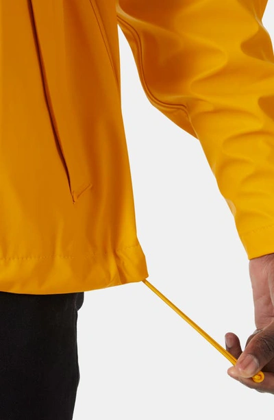 Shop Helly Hansen Moss Waterproof Rain Jacket In Essential Yellow