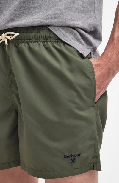 Shop Barbour Staple Logo Embroidered Swim Trunks In Olive