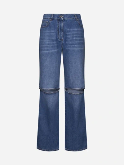 Shop Jw Anderson Cut-out Knee Jeans In Blue