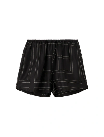 Shop Totême Monogram Silk Pj Shorts In Black