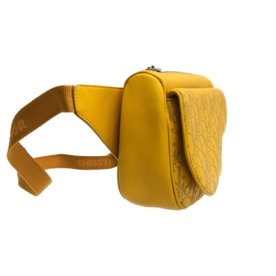 Shop Dior Oblique Yellow Leather Clutch Bag ()
