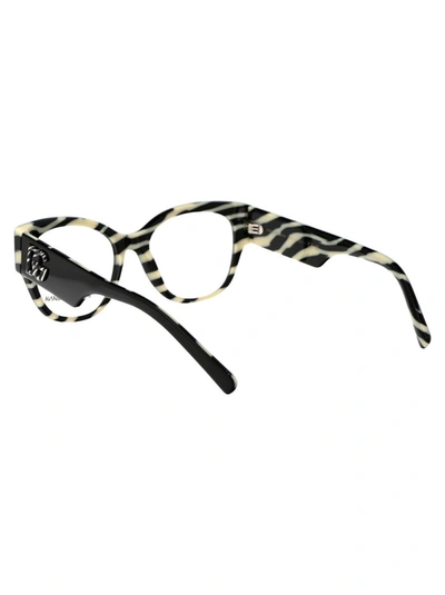 Dolce & Gabbana Eyewear Oval Frame Glasses In Black