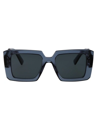 Shop Prada Sunglasses In 19o70b Transparent Graphite
