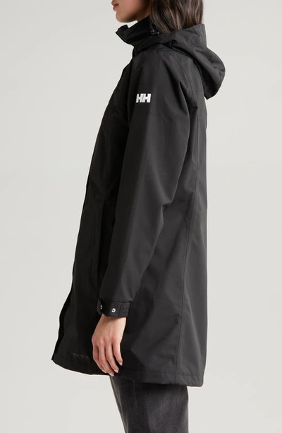 Shop Helly Hansen Aden Waterproof Hooded Longline Rain Jacket In Black