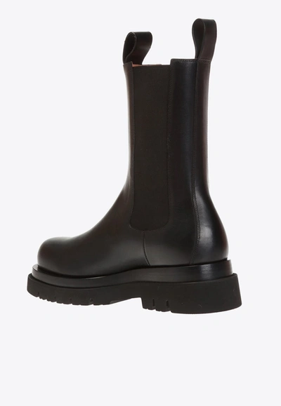 Shop Bottega Veneta Ankle Lug Boots In Calfskin In Black
