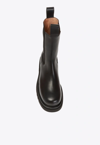 Shop Bottega Veneta Ankle Lug Boots In Calfskin In Black
