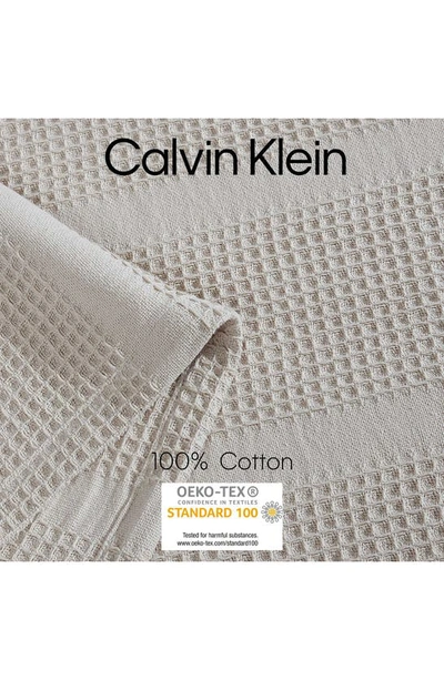 Shop Calvin Klein Waffle Weave Stripe Cotton Blanket In Beige/ Tan
