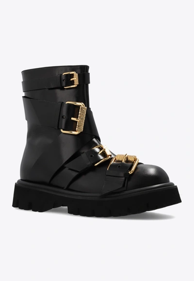 Shop Moschino Buckle-detail Leather Ankle Boots In Black