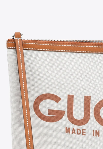 Shop Gucci Canvas Logo Pouch In Beige