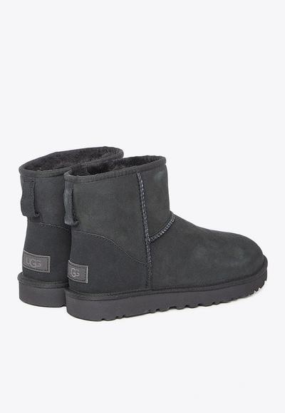 Shop Ugg Classic Mini Ii Snow Boots In Black