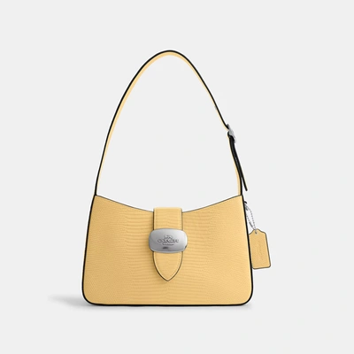 Shop Coach Outlet Eliza Shoulder Bag In Yellow