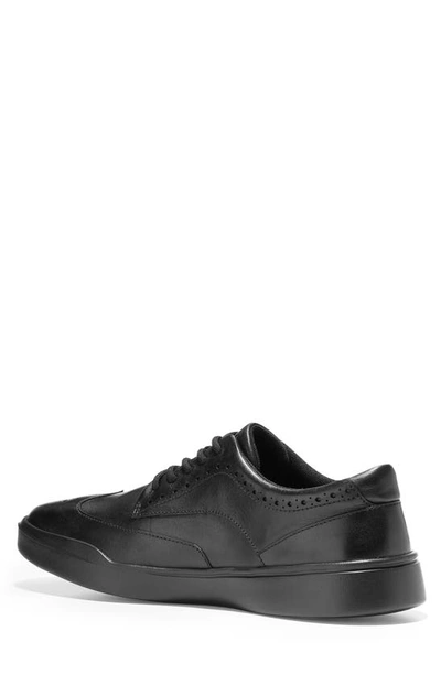 Shop Cole Haan Grand Crosscourt Wingtip Sneaker In Black Leather/ Black