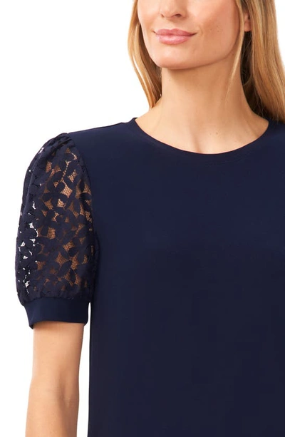 Shop Cece Lace Puff Sleeve Knit Top In Classic Navy