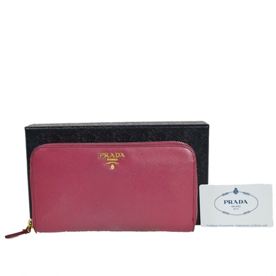 Shop Prada Round Zipper Pink Leather Wallet  ()