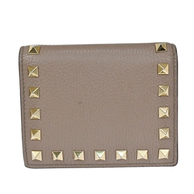 Shop Valentino Garavani Rockstud Beige Leather Wallet  ()