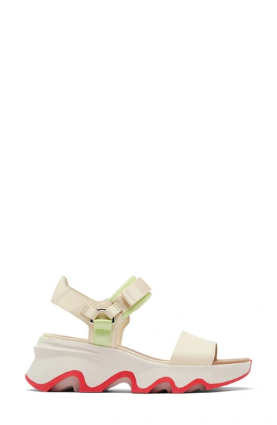 Shop Sorel Kinetic™ Y-strap Sandal In Honey White/ Luminous Lime
