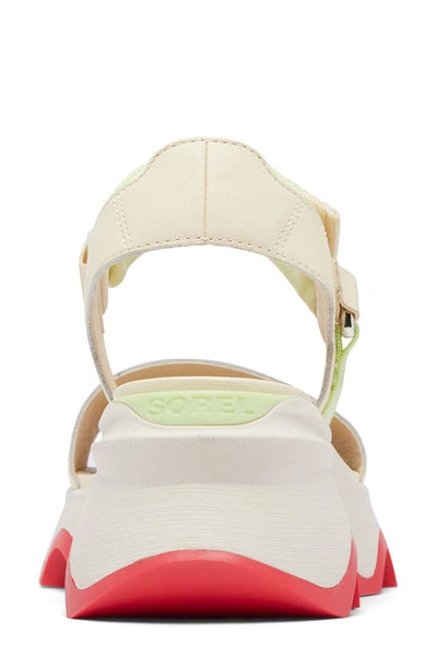 Shop Sorel Kinetic™ Y-strap Sandal In Honey White/ Luminous Lime