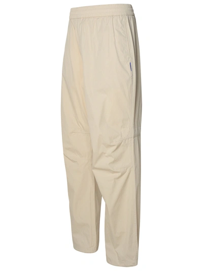 Shop Burberry Man  Beige Cotton Blend Trousers In Cream