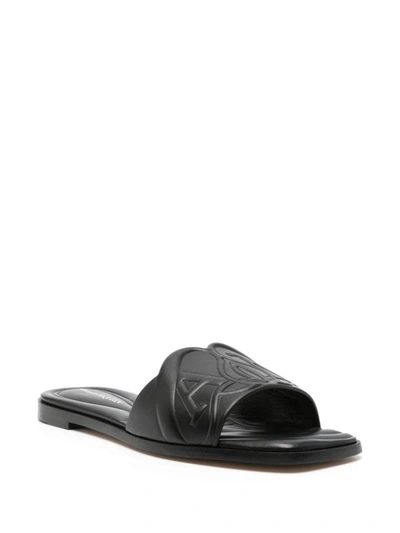 Shop Alexander Mcqueen Seal Leather Flat Sandals In Black