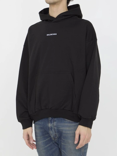 Balenciaga Relaxed-fit Cotton Hooded Sweatshirt With Design In Black