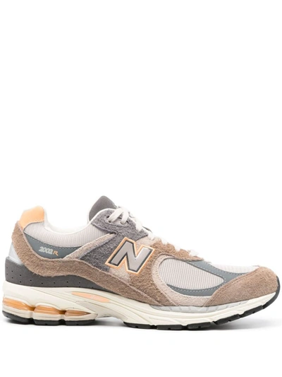 Shop New Balance M2002r Sneakers In Brown